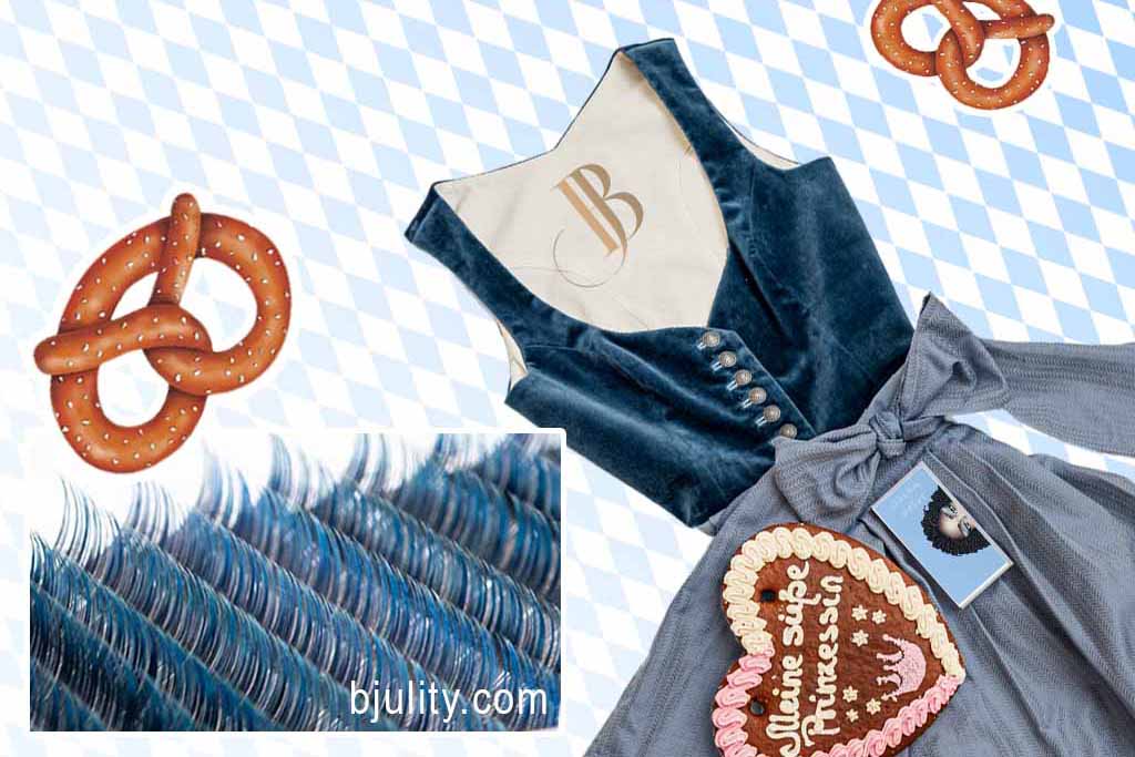 Blaues Dirndl mit blauen Farbwimpern für den Wiesnlook